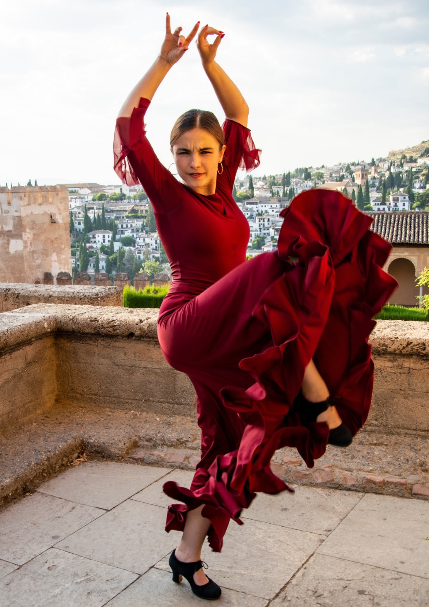 BARBARA LIBRE dancing flamenco in a red dress at the Alhambra, Granada