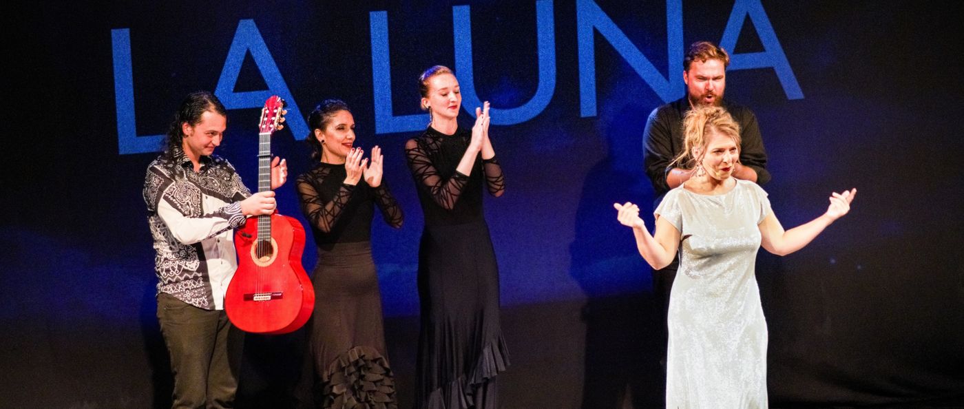 The LA LUNA cast on stage at the curtain call